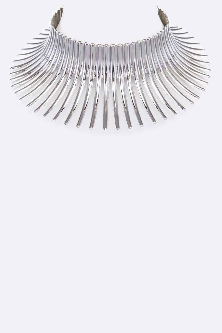 Silver fringe necklace on a white background